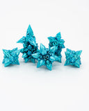 Set of blue polyhedral dice on a white background