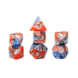 Set of dice with red, blue, and silver colors on a white background