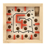 Wooden puzzle with numbered holes and red pegs on a white background