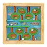 Wooden toy with bird's nests and eggs on a blue background