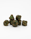 Set of ornate metal dice on a white background