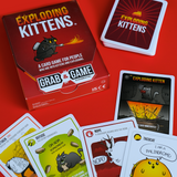 Exploding Kittens card game packaging and cards on a red background