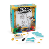 The 'I Suck At Drawing' card game set with its illustrated box, cards, tokens, and drawing tools, displayed on a clean white background.