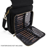 Black brush holder with gold paintbrushes on a white background