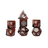 Set of polyhedral dice with red and white patterns on a white background