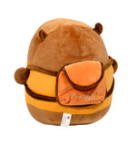 A plush toy shaped like a character wearing a yellow and orange apron with brown trim, featuring the word 'Everdell' embroidered on the front pocket, shown against a plain white background.