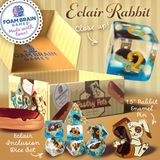 Eclair Rabbit product set with packaging and enamel pin from Foam Brain Games.