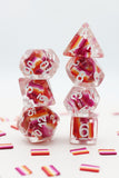 Set of colorful polyhedral dice on a white background