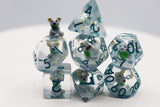 Set of clear dice with animal figures on a white background