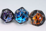 Three polyhedral dice with unique designs on a white background