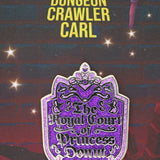 Purple pin with text on a starry night sky background, featuring 'Dungeon Crawler Carl' and 'The Royal Court of Princess Donuts'.