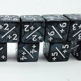 Set of black dice with white numbers and symbols on a white background