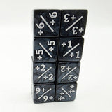 Set of black dice with white numbers and symbols on a white background