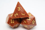 Foam Brain Games: Gemstone Dice Set - Red Goldstone/Gold (7)
