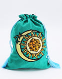 Turquoise drawstring bag with sun and moon design on a white background