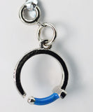 Silver ring with a blue accent on a light gray background