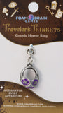 Cosmic Horror Ring charm on Foam Brain Games packaging