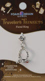Silver ring charm on a Foam Brain Games branded card
