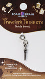 Noble Sword charm on a Foam Brain Games packaging