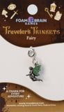 Fairy charm on a Foam Brain Games card with decorative elements.