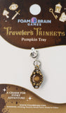 Foam Brain Games Traveler's Trinkets Pumpkin Tray charm on packaging