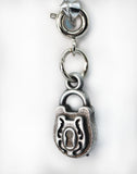 Silver padlock charm on a white background