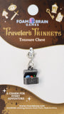 Traveler's Trinkets charm for Treasure Chest on Foam Brain Games packaging
