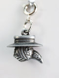 Silver pendant with a unique design on a white background