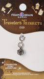 Traveler's Trinkets D20 charm on Foam Brain Games packaging