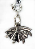 Silver umbrella charm on a white background