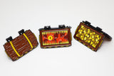 Three toy crates with different designs on a white background