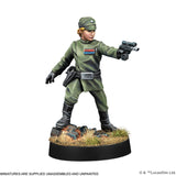 Model figure of a character in green military-style outfit with a gun on a white background