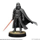 Darth Vader figurine with a red lightsaber on a white background