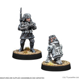 Two miniature figures on a white background, one resembling a human soldier with weapons and the other a robot.