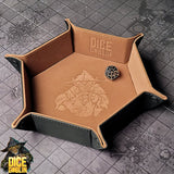 Dice tray with embossed design and Dice Goblin logo on a textured surface