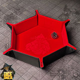 Red and black dice tray with a dice on a gray surface, featuring Dice Goblin branding.