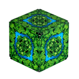 A cube-shaped floor cushion with a vibrant green forest canopy and blue river pattern, shown on a plain white background.