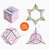 Geometric shape-changing toy with packaging featuring penguin illustrations on a white background.