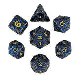 Set of polyhedral dice with black, blue, and gold colors on a white background