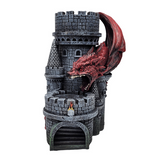 Decorative castle with a red dragon on top against a white background