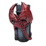 Decorative figurine of a red dragon on top of a castle tower.