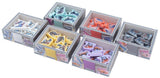 Set of small cardboard boxes with printed images on a white background