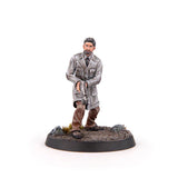 Miniature figure of a character in a gray coat with a weapon on a white background