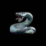 Realistic snake sculpture on a black background