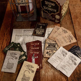 Collection of 'Legend of Lochkey' escape room cards and documents on a wooden surface.