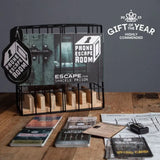 Phone Escape Room game set with packaging and components on a wooden surface, featuring 'Gift of the Year' award text.