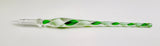Glass object with green and white pattern on a white background
