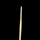 Paintbrush with a wooden handle and metal ferrule on a black background