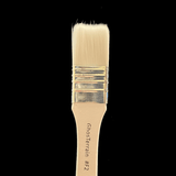 Paintbrush with wooden handle and natural bristles on a black background