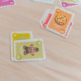 Colorful card game cards on a wooden surface